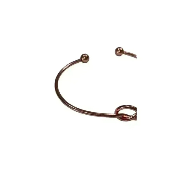 Love knot bangle7 inches around gold tone - Picture 3 of 4